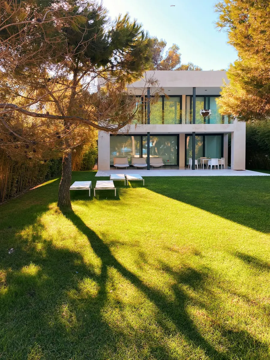 House in a garden in low golden light