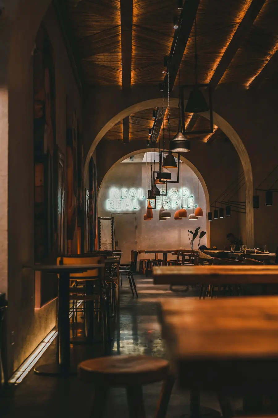 Warmly lit dining room in the evening