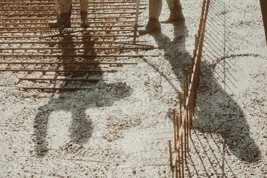 Rebar and fresh concrete on site